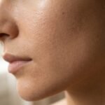 Close-up of naturally luminous skin illustrating the Korean glass skin routine 2026