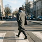 Woman in a wool overcoat illustrating the best premium clothing brands for women